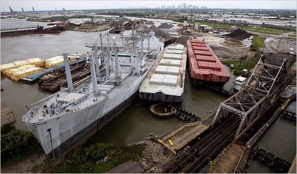 Ships and barges cluttered the banks of the Industrial Canal in New Orleans in the wake of Hurricane Gustav. Credits : Eric Gay/Associated Press.