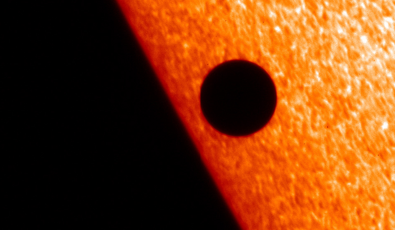 A planetary transit occurred inside our own solar system in 2006 when Mercury passed in front of the Sun. Credits: ESA/Solar Optical Telescope (SOT).